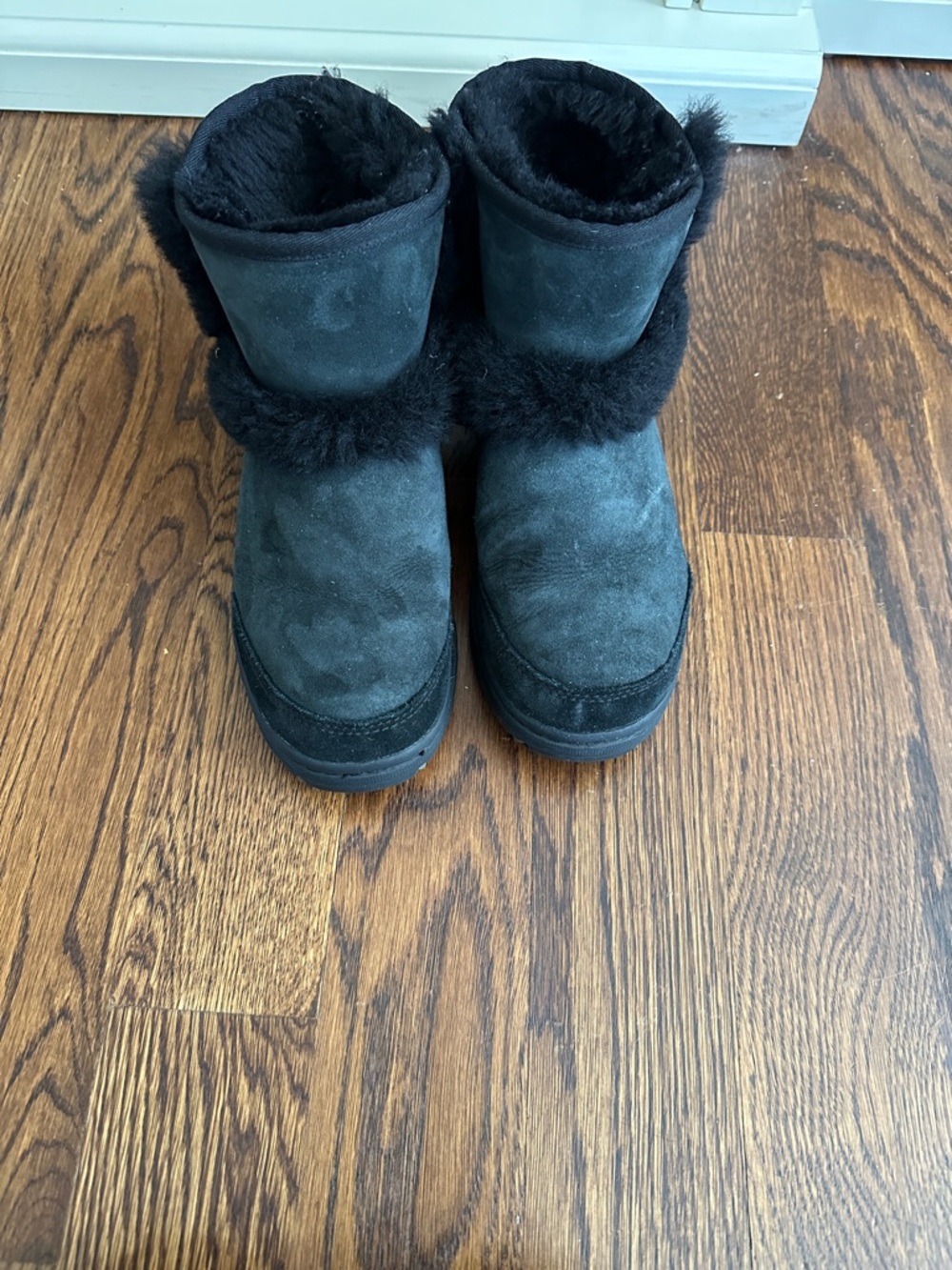 UGG Black Short Shearling Boot with Pom Detail - Picture 9 of 10